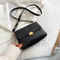 Minimalist black square crossbody bag with adjustable strap and gold metal buckle - Black