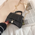 Mini black crocodile embossed handbag with golden chain strap and large pearl charm - Black