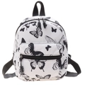 Mini-Leinenrucksack mit Schmetterlingsdruck, schwarzen Trägern und Haupt-Reißverschlussfach - Schwarze Schmetterlingsanhänger