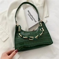 Dark green faux crocodile baguette bag with decorative acrylic chain on white jacket - Green