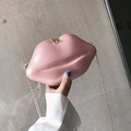 Cute pink lip-shaped crossbody bag with glossy finish and gold chain strap - Pink