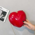 Chic red heart shaped mini chain bag with glossy finish and gold metal zipper - Red