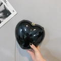 Chic black heart-shaped mini chain bag with glossy finish and golden metal strap - Black