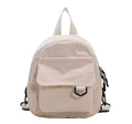Close-up of beige corduroy mini backpack featuring metal D-ring and fabric straps - Beige