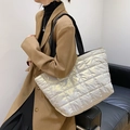 Quilted down tote bag in metallic champagne silver with wide black shoulder straps - White