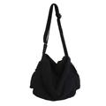 Borsa a tracolla unisex capiente in tela lavata nera con tracolla regolabile e tasche laterali - Nero