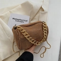 Amber rhinestone cylinder handbag with gold chain straps on a beige aesthetic background - Gold