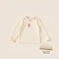 Gevoerd crème shirt met lange mouwen voor meisjes met roze strikjes en konijntje - 80 / Broken Wit