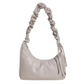 Chique beige PU-leren halvemaantas met geplooide schouderband en trendy zijkwastjes - Beige