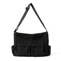 Versatile black canvas crossbody bag with large front pockets and adjustable strap - Black