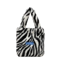 Borsa a mano invernale in peluche a zebra con elegante etichetta tessuta blu - Zebra Print