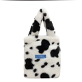 Borsa a mano minimalista in ecopelliccia con stampa mucca bianca e nera ed etichetta blu - Stampa mucca
