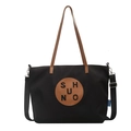 Minimalistische schwarze Nylon-Tragetasche mit braunen Ledergriffen und Tragegurt - Schwarz