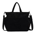 Bolso de mano minimalista en pana negra con bolsillos externos y correa de hombro ajustable - Negro