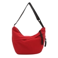 Chic red half-moon crossbody bag in sleek nylon fabric with black adjustable strap - Red