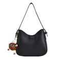 Minimalist black PU leather crescent shoulder bag with cute monster plush charm - Black