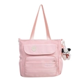 Chic pink nylon shoulder bag for women with multiple pockets and a cute puppy charm - Pink