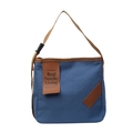 Minimalist blue canvas crossbody bag with adjustable brown strap and decorative leather patch - Blue