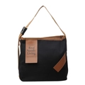 Minimalist black canvas tote bag with brown woven straps and leather patch details - Black