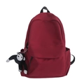 Donkerrode nylon rugzak voor dames met een schattige pluche aap sleutelhanger accessoire - Rood