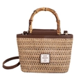 Modische beige Stroh-Handtasche mit Bambusgriff und braunen Lederriemen für Damen - Braun