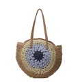 Stro strandtas met blauw contrast cirkelpatroon en bruine lederen hengsels - Blauw