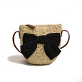 Borsa a tracolla primaverile in paglia intrecciata con grande fiocco nero e tracolla in pelle - Beige