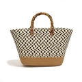 Woven handbag with black and white wave pattern and natural bamboo handle detail - Black