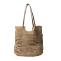 Woven straw tote bag in light brown with brown leather handles and metal rivets - Khaki
