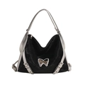 Chic black velvet hobo bag with silver butterfly emblem and metallic straps for women - Black