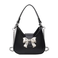 Black glossy leather hobo bag with a large silver metal bow buckle and chain strap - Black Small