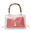Transparent PVC handbag with coral woven inner pouch and natural bamboo handle detail - Rose Pink