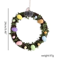 Detail showing Easter rattan wreath with colorful eggs, green leaves and grey plush bunny - Gray