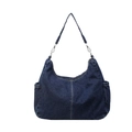 Deep blue denim hobo bag with white stitching and side pockets in a minimalist style - Dark Blue