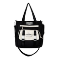 Minimalist black and white contrast nylon crossbody bag with twin top handles and front buckles - Black