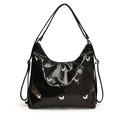 Borsa hobo minimalista in pelle PU nera lucida con ciondoli a farfalla in argento su sfondo bianco - Nero