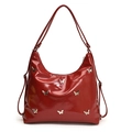 Borsa a spalla in pelle PU rosso scuro lucido con decorazioni a farfalla argento - Rosso