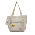 Chique crème nylon schoudertas met kleurrijke pluche sterren en een smiley-patch - Wit