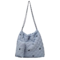 Light blue quilted polyester tote bag with black bow embroidery and chain strap - Blue