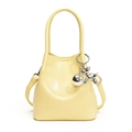 Minimalist light yellow PU leather bucket bag with cute silver balloon dog charm - Yellow
