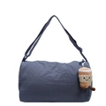 Blue cylindrical nylon crossbody bag with adjustable strap and cute plush charm - Blue With Pendant