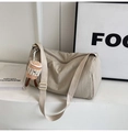 Beige cylindrical nylon crossbody bag with wide strap and cute mini plush charm - Rice White (Without Charm)