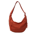 Versatile orange canvas crescent crossbody bag with adjustable wide strap and woven zipper pull - Orange