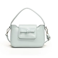 Minimalist light blue PU leather crossbody bag with bow decoration and silver strap hooks - Blue