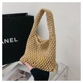Detail of handmade crochet mesh tote bag with inner lining and thick rope texture - Khaki