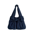 Dark blue denim tote bag featuring large bow design and knotted shoulder strap - Dark Blue