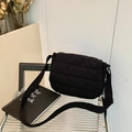 Minimalist black quilted nylon crossbody bag for women with adjustable strap and fluffy texture - Black