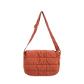 Quilted caramel crossbody bag with adjustable shoulder strap and matte finish texture - Brown