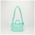 Detailed close-up of mint green quilted nylon bag featuring knotted padded shoulder straps - Lake Blue