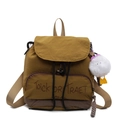 Mustard yellow fabric backpack with drawstring closure and white monster pendant - Yellow